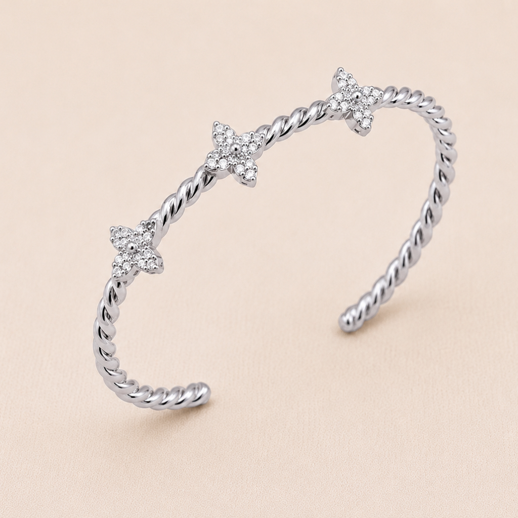 TWISTED CLOVER SILVER BANGLE